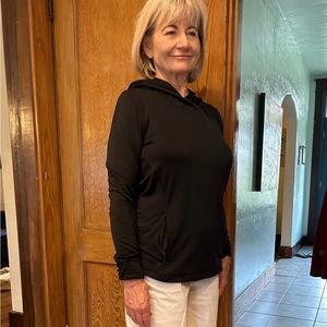 Athleta size M long sleeved black hooded top
